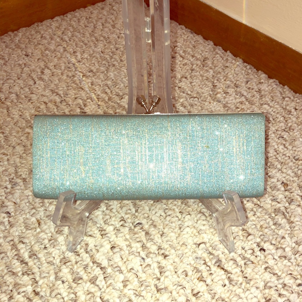 Aqua and silver glitter clutch.